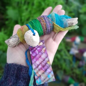 One Art Yarn Bundle On Branch Bobbin Rainbow Fiber Art Supplies Handspun Wool Hand Dyed Cotton Weaving Handweaving Tapestry Driftwood Spun
